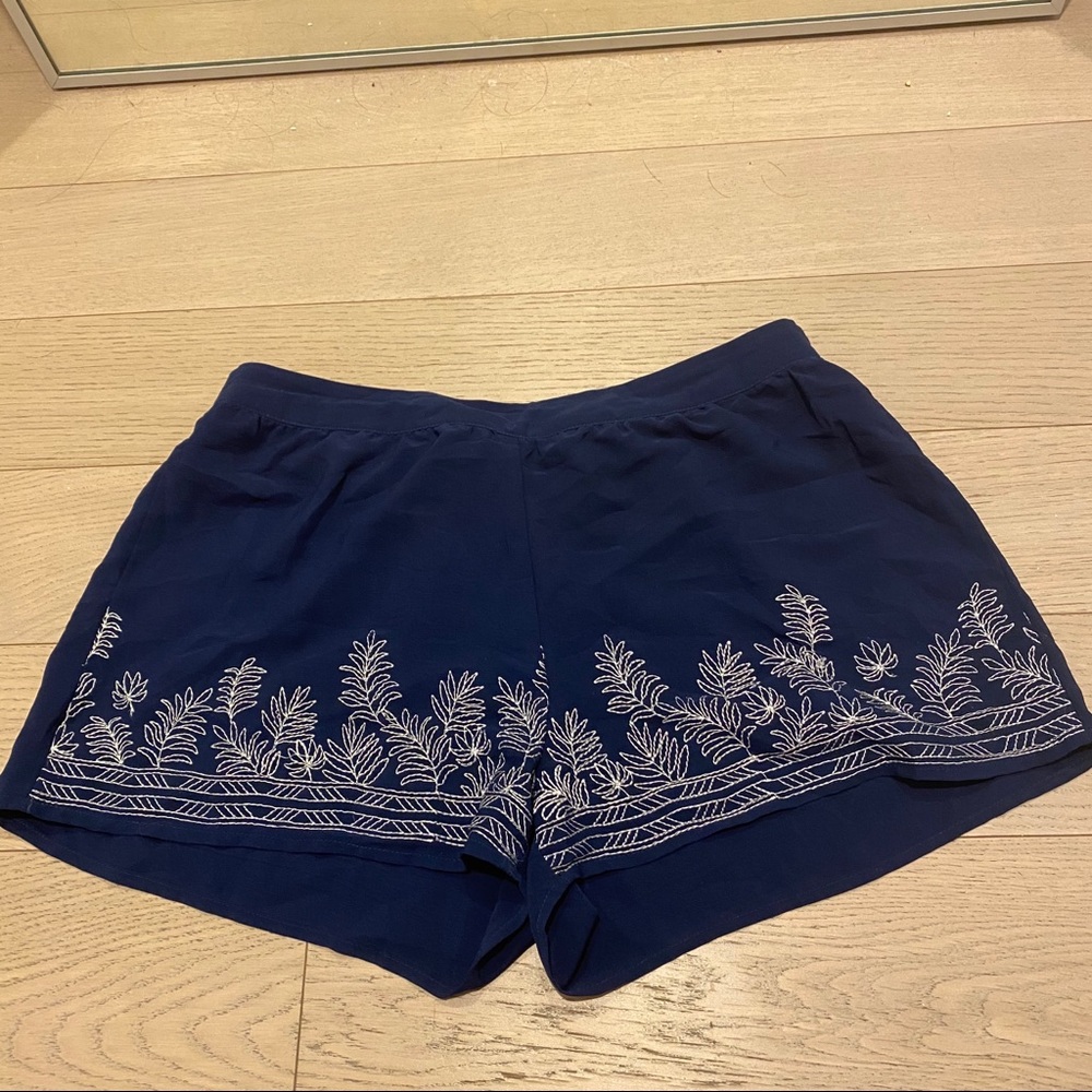 Navy shorts with floral embroidery